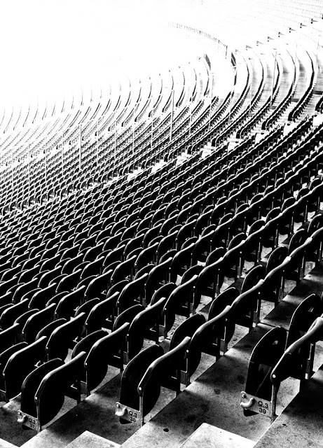Berlin's Olympic Stadium seating in black and white shot by Dennis Marciniak