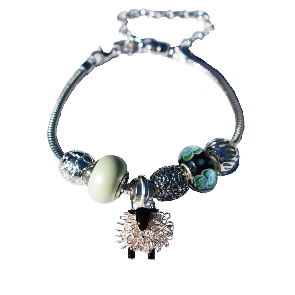silver sheep pandora style charm bracelet.jpg