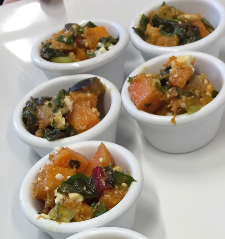 Pumpkin and fig salad with Swiss chard and feta presented by fresh table at findlay Market