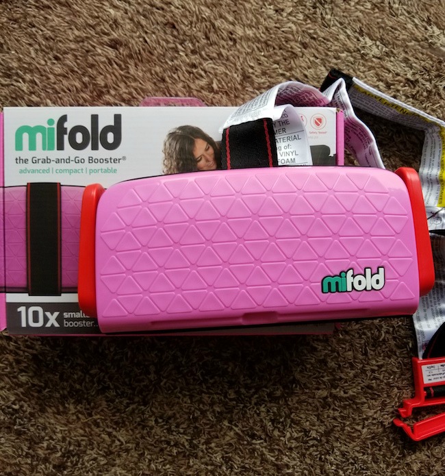The mifold Grab-and-Go booster seat is amazing! We received one a few weeks ago and have been using it as the sole booster seat for Joley since then. My first impression was that the small size was perfect! It can fold up so small that it can fit into a backpack or glove compartment. Now when Joley needs a ride in someone’s car for school or a field trip, she can be safely transported with the mifold Grab-and-Go booster seat.   