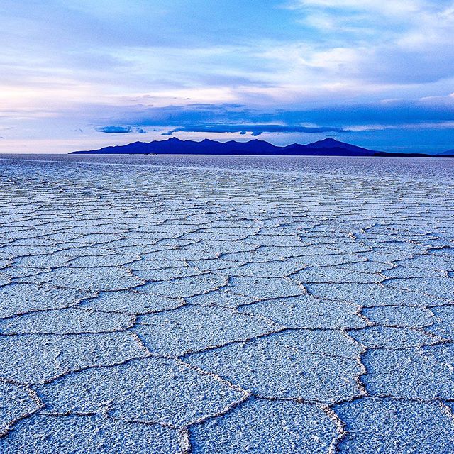 A salty good morning to you. Sunrise on the world's largest salt flat, Salar de Uyuni, in southern Bolivia.