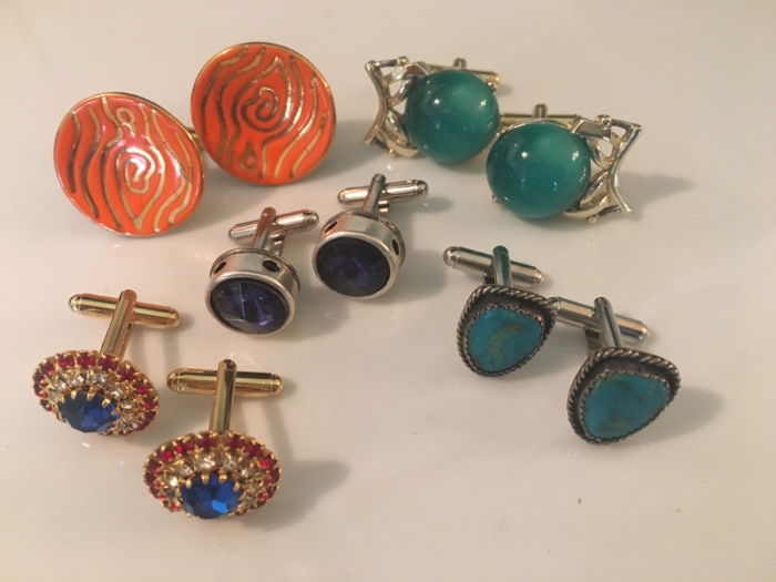 Cuff links made from old clip on earrings.