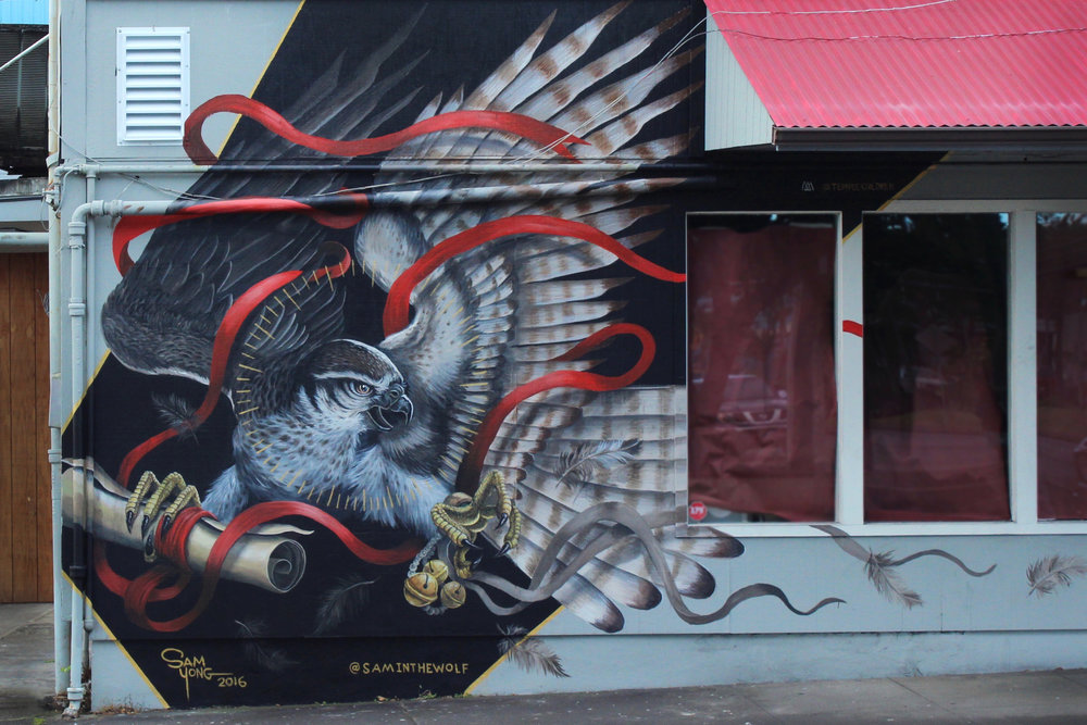 MURAL BY SAM YONG (@SAMINTHEWOLF) ON THE CORNER OF PONAHAWAI AND KINOOLE IN DOWNTOWN HILO. 
