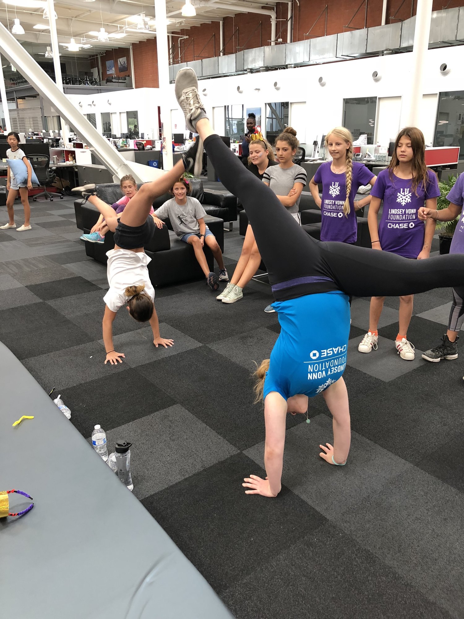  Camper/mentor handstand contest. An average activity at an all girls athlete camp.&nbsp; 