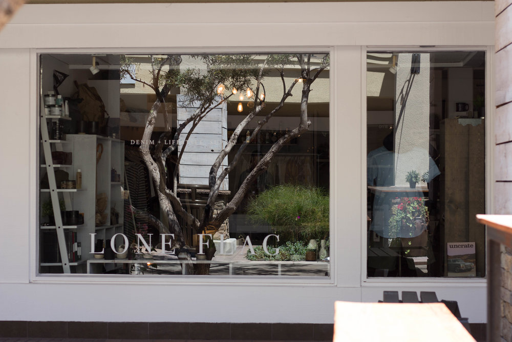 front entrance of lone flag menswear store