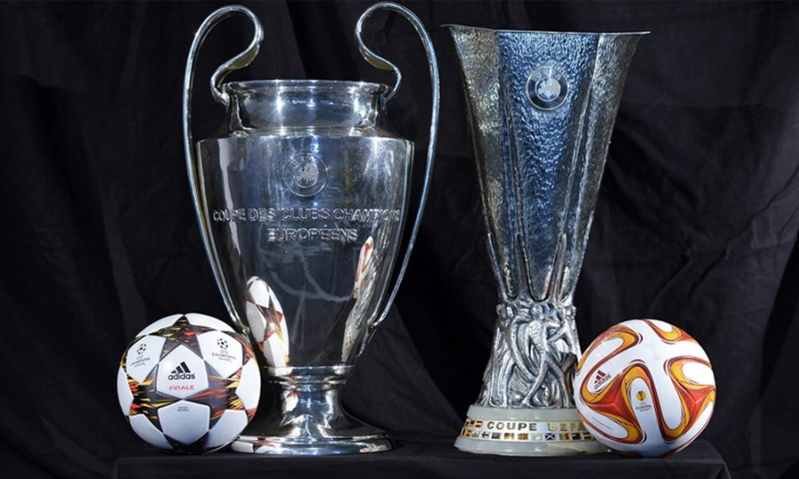 Image result for champions league trophy and europa league trophy