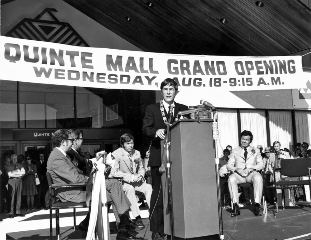 Mayor Russell Scott presides at the podium during the official opening ceremony of the Quinte Mall. Among his numerous positions and roles in the community, Dr. Scott was Mayor of Belleville from 1968 to 1972. Photo courtesy of the Belleville and Hastings County Community Archives