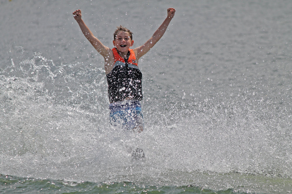   Camp-Can Aqua on Beaver Lake, offers a variety of watersports including waterskiing, sailing, windsurfing, paddle-boarding, kayaking, canoeing, and swimming lessons. Photo Courtesy of Camp Can Aqua.  