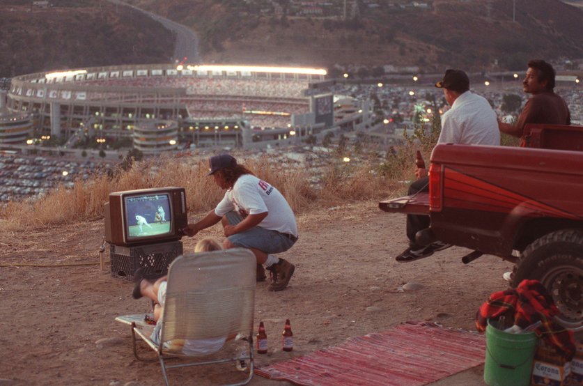  Grandstanders watch the MLB All Star Game from a hill overlooking Jack Murphy Stadium, San Diego, 1992; Image by Charles Starr 