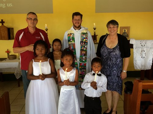Here I am with our two lay ministers in charge of Evensong (far left and right) at a baptism Easter Sunday in Georgeville.