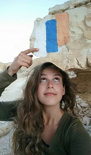 Denise with a marker of the Israel Trail. Negev. Denise_Stolnik_FB_album.jpg