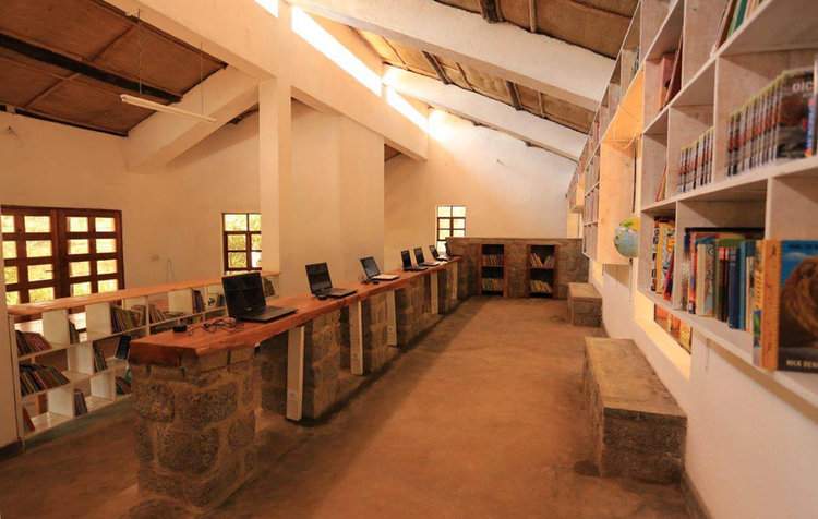 Inside the library. The computers and books are free for the community to use. 