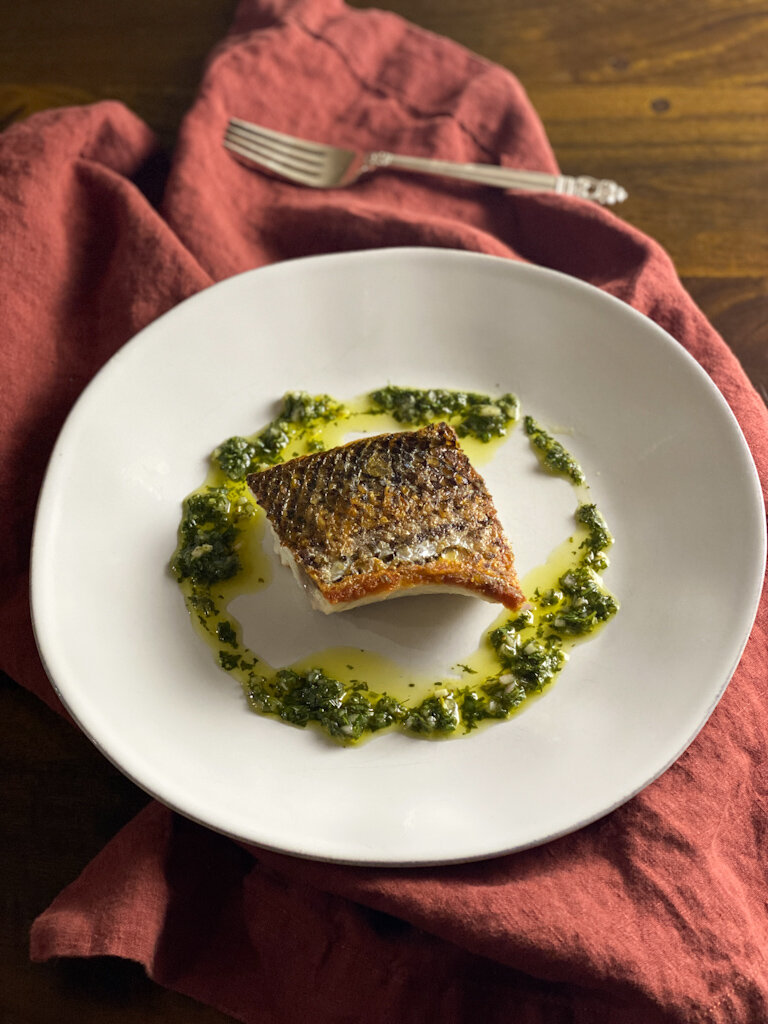Crispy-Skinned Striped Bass with Tangy Green Everything Sauce