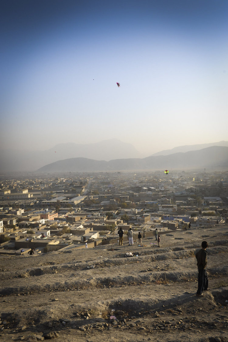  Afghans gather on a Friday on Nadir Shah Hill, or Kite Hill- to fly paper kites and battle others in a traditional match. When a Kite is cut children with long brooms have to catch the kites before their prize blows away. Kite flying is a popular recreation for Afghan children 
