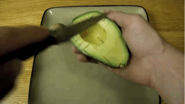  Cut into the avocado in a tight crisscross pattern. 