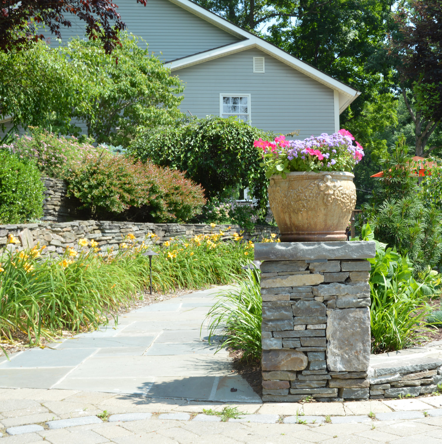 Using Steps And Pillars To Upgrade Your Oyster Bay NY Front Yard