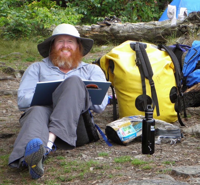   Teague in Minnesota's Boundary Waters Canoe Area, August 2014, at the beginning of his semester sabbatical to write his first draft of  Caught Between The Mountain And The Sky. 