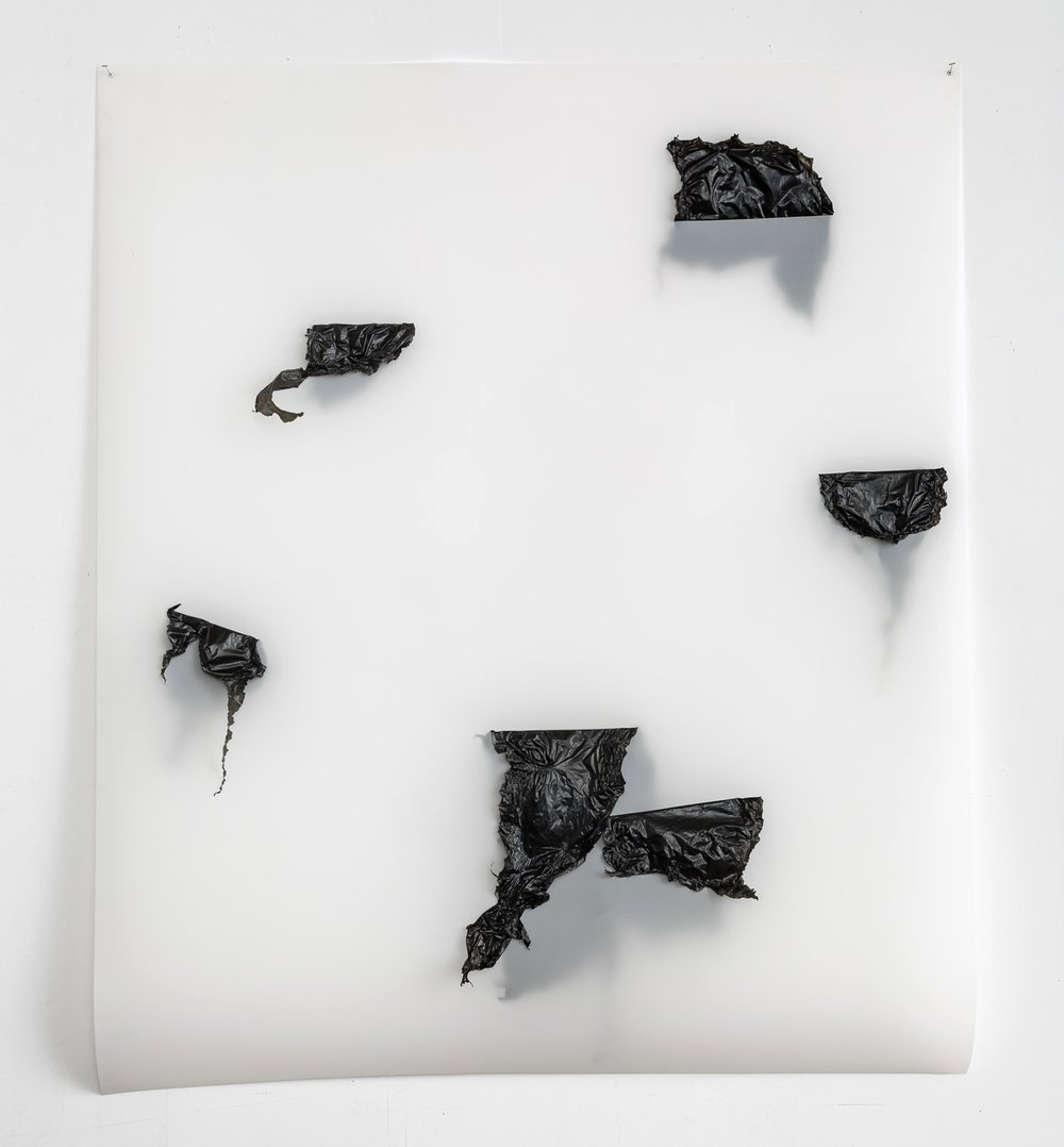  Sliced Polyglot #3 (2016); Plastic garbage bags, metal staples & eyelets on Mylar; 49.5 x 42.5 x 3 inches 