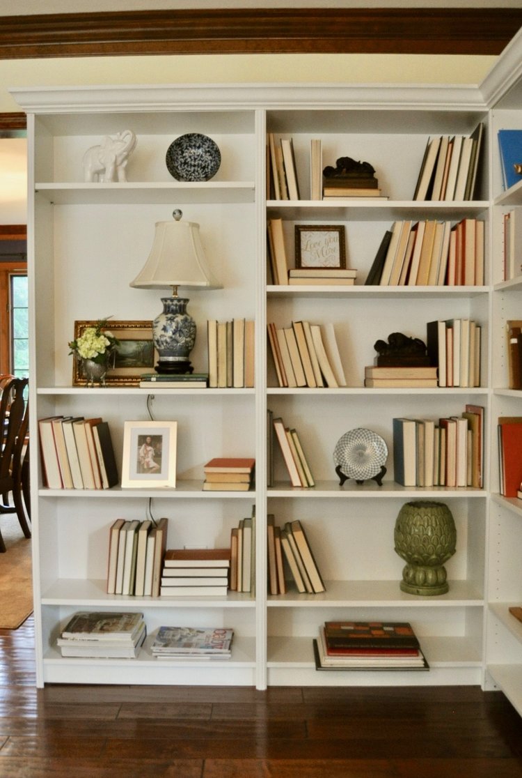 Built in bookshelves are staged for the open house