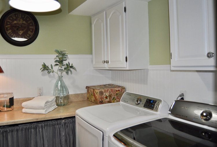 Laundry room that is loaded with function and style