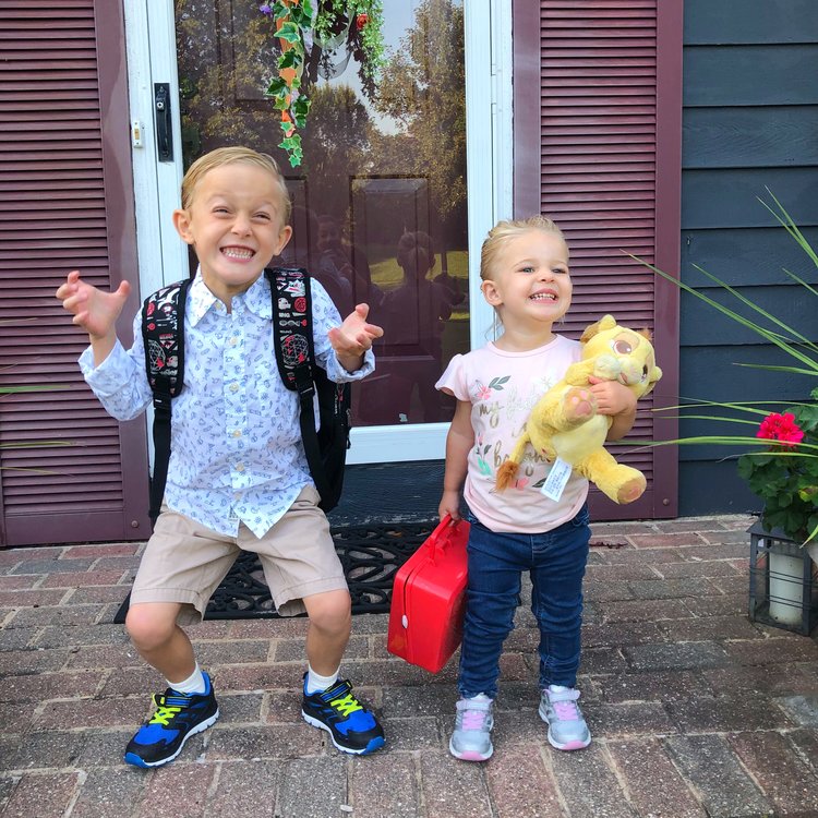 These two kids are excited to go to school
