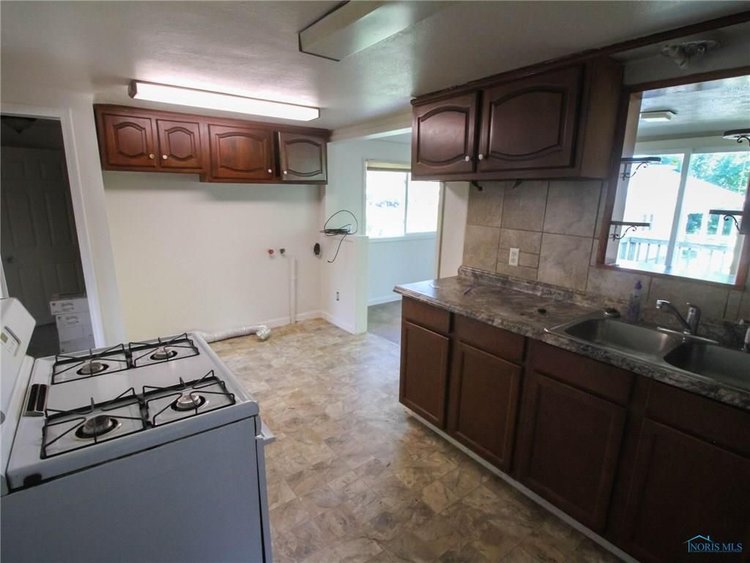 Rental property kitchen before renovations