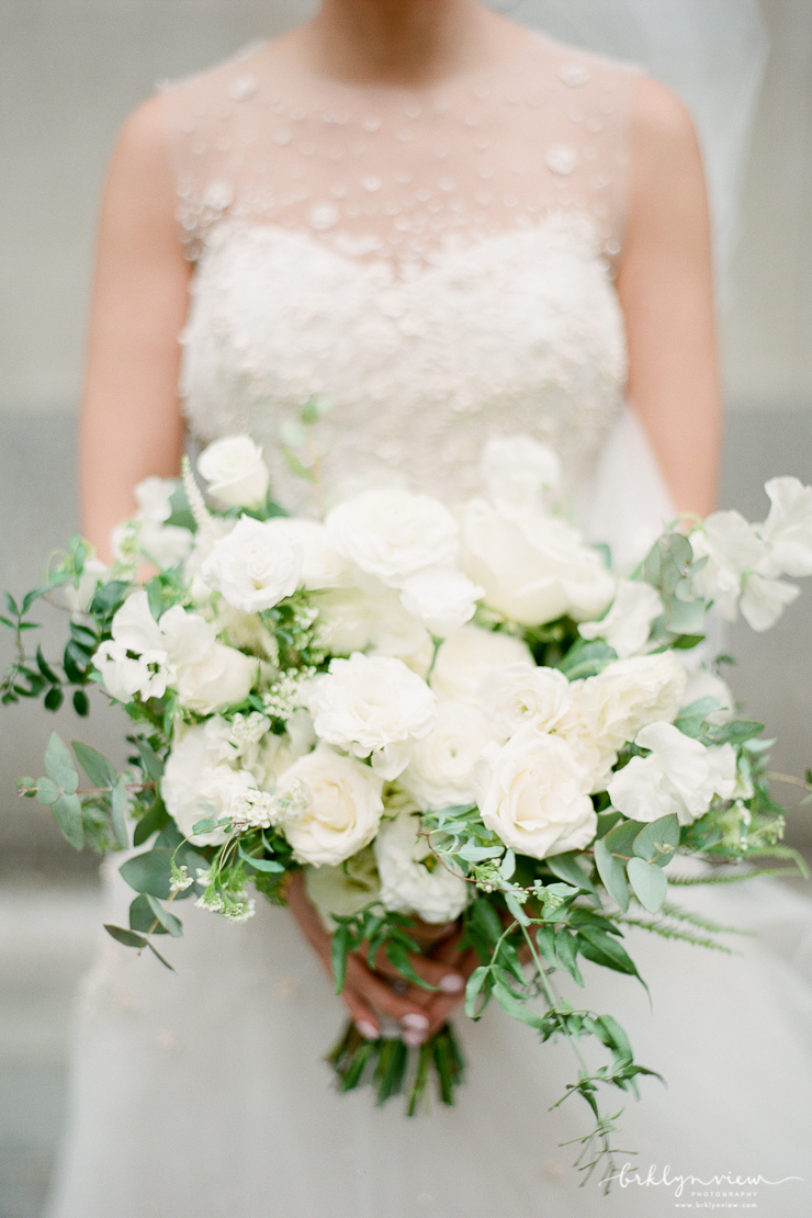 Close Up Photo of Brides White Wedding Bouquet