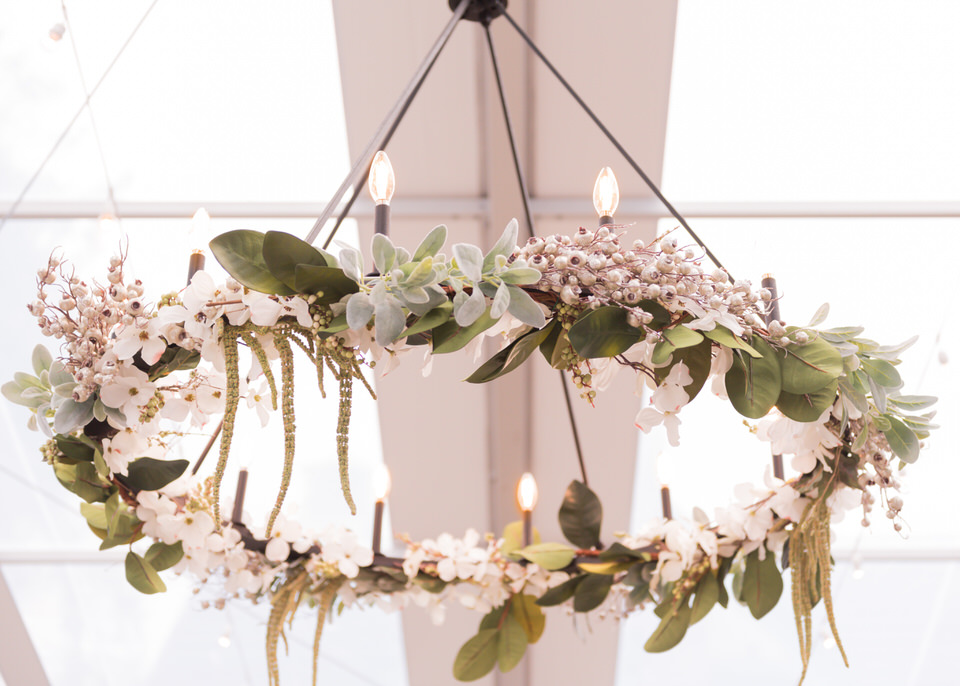 chandelier with floral arrangement