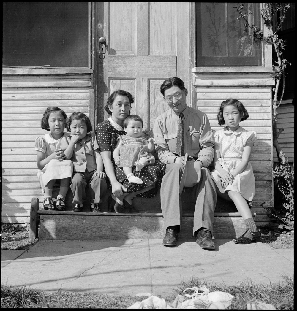  Mountain View, California. Henry Mitarai, age 36, successful large-scale farm operator with his family on the steps of their ranch home, about six weeks before evacuation. This family, along with others of Japanese ancestry, will spend the duration at War Relocation Authority centers. 