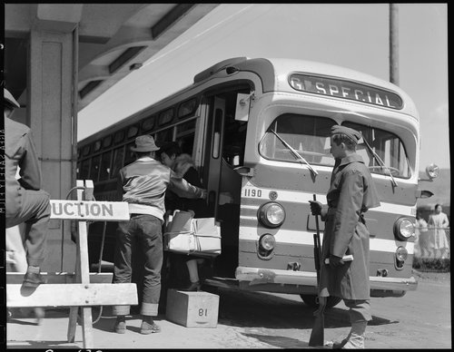  San Bruno, California. A Greyhound bus bringing evacuees to the assembly center. 