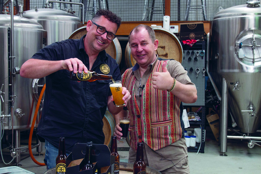  Matt Bebe, from Mornington Peninsula Brewery, pours one of his beers for Steve to sample. 