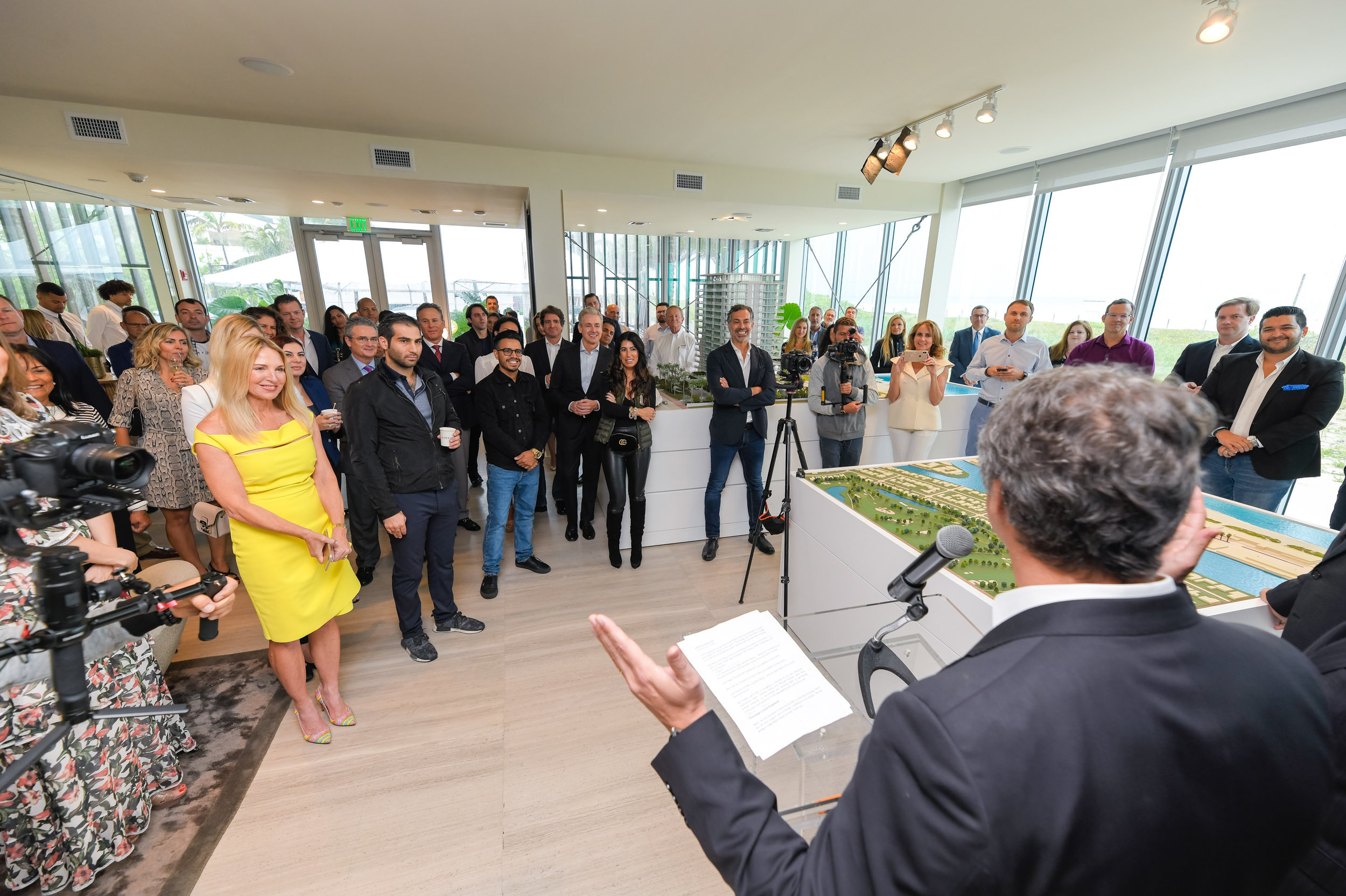 Guests gather for opening remarks of groundbreaking ceremony Multiplan Real Estate Asset Management Breaks Ground On 57 Ocean In Miami Beach Demetri Demascus PROFILEmiami