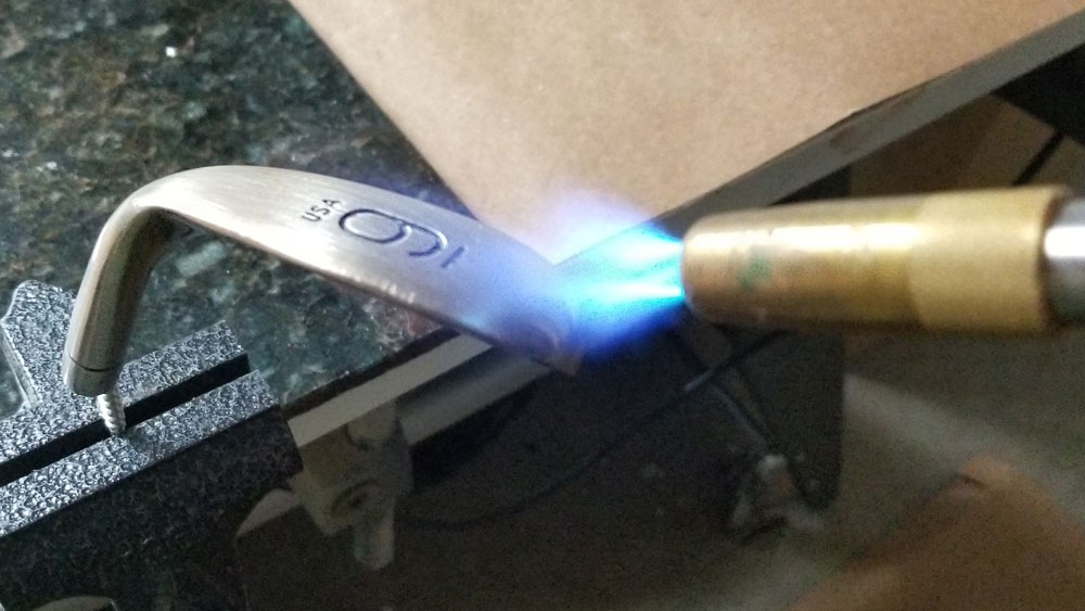 Torch heating a 9 iron