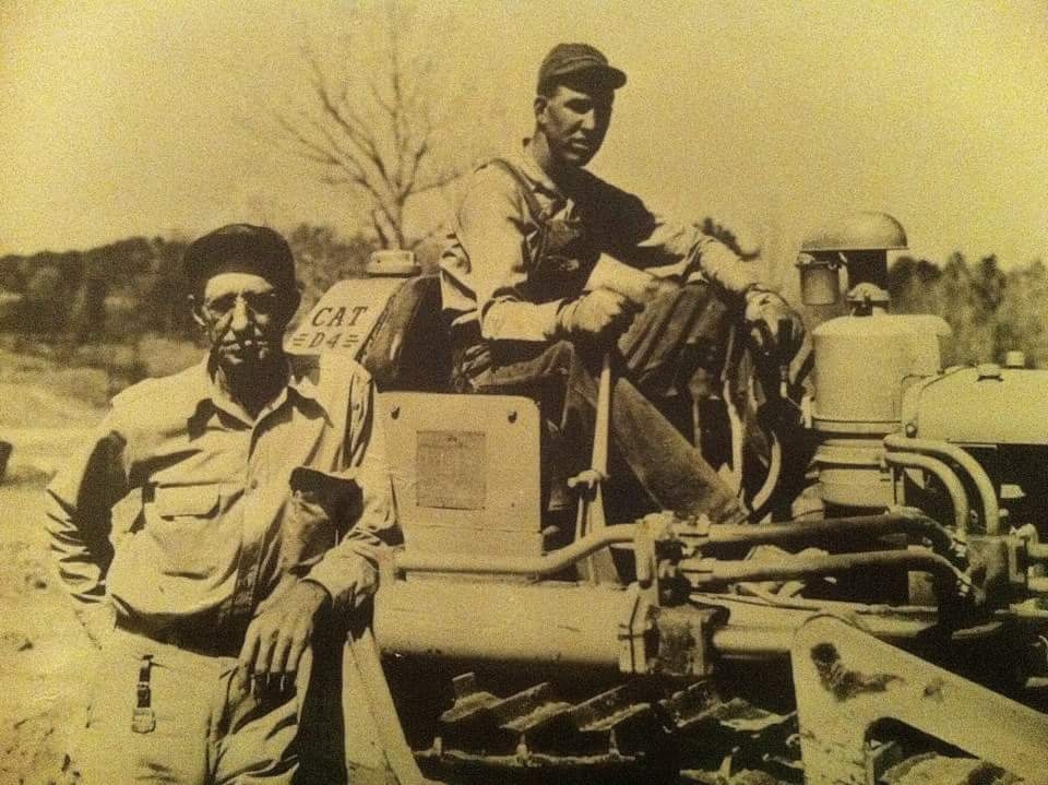 arley moss (Left) and ted moss (on the old caterpillar) in the 1950's at cullum construction