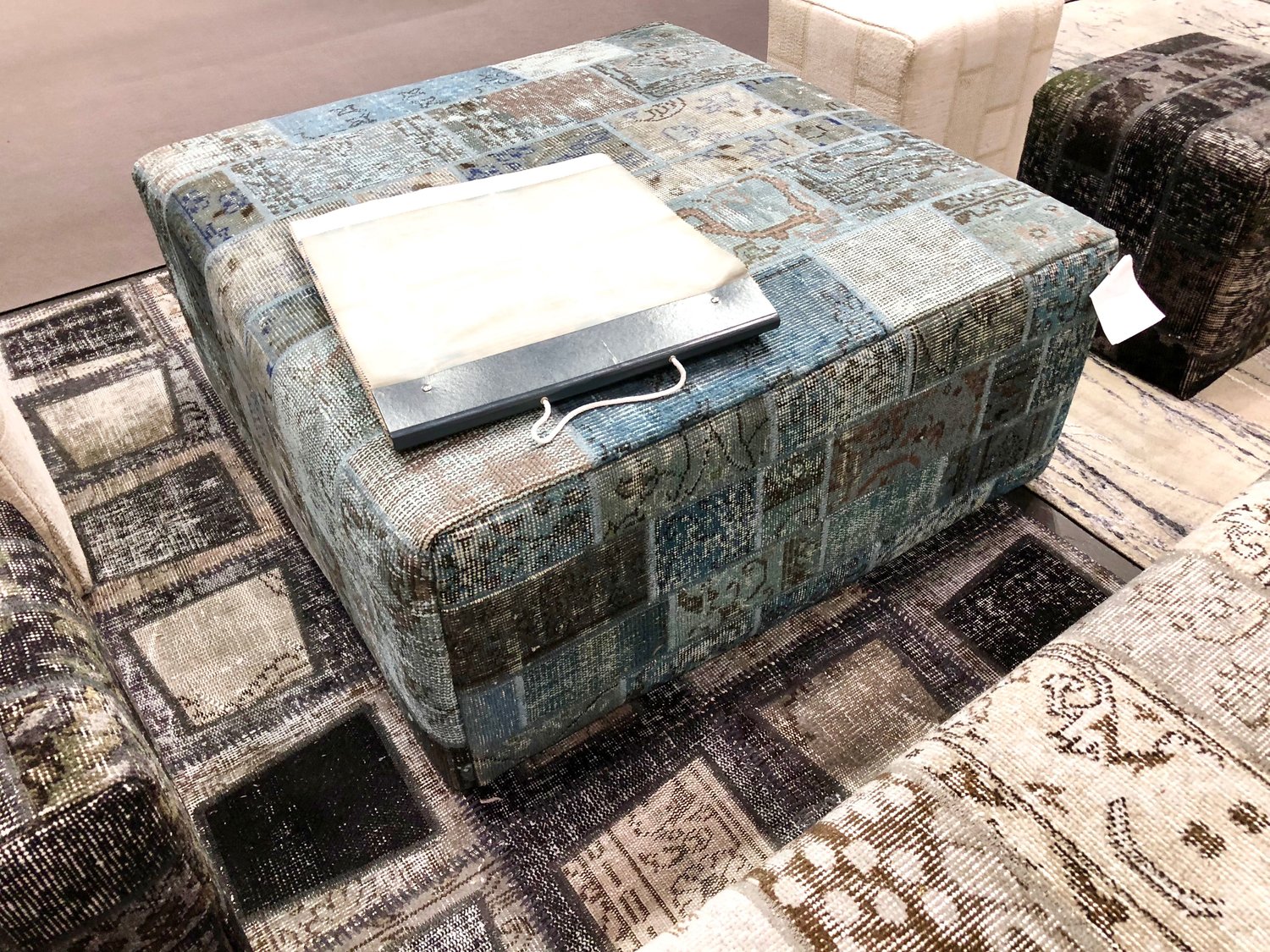 Custom Vintage Patchwork Ottomans -- now available in a variety of colors.  I love the black style.