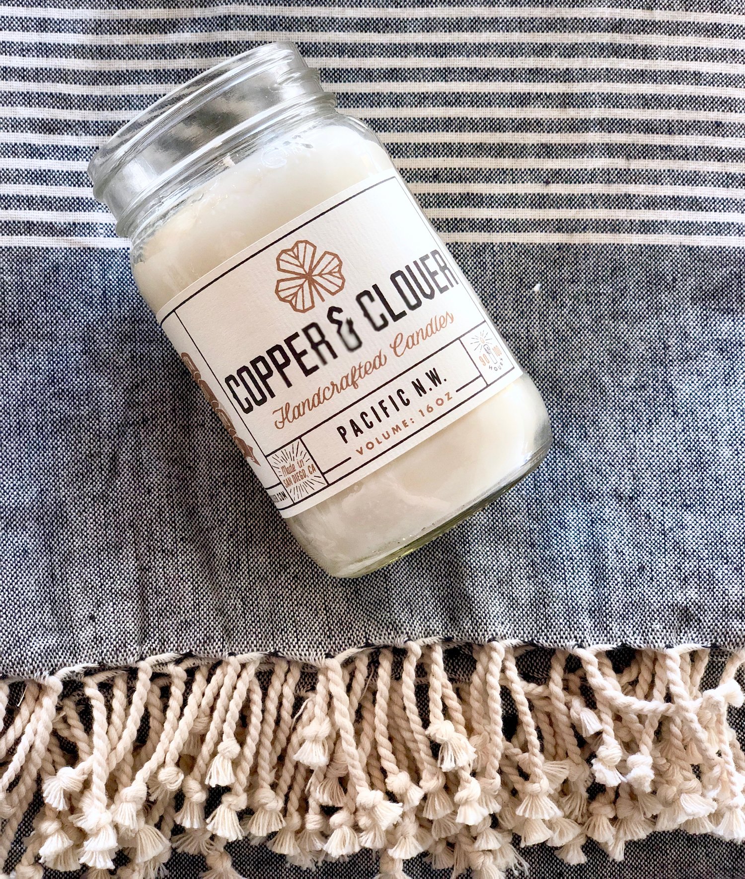  Pacific Northwest Candle by Copper &amp; Clover {$26.00}&nbsp; Notes of lavender, musk, oakmoss, and orange. 