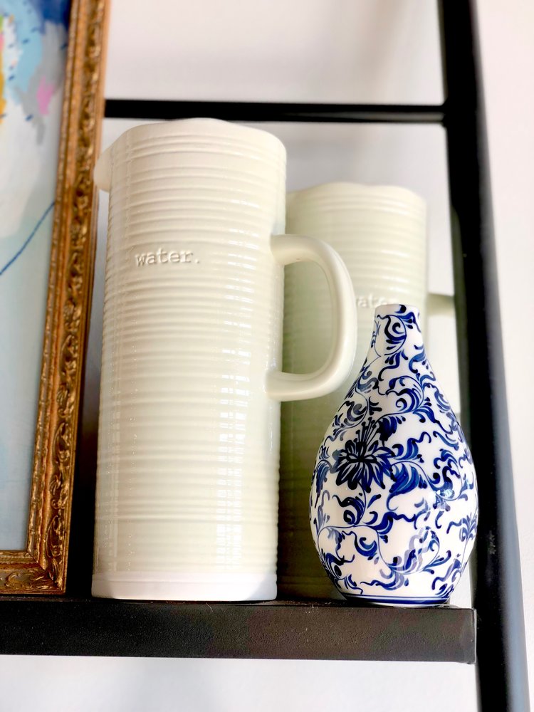   Water Pitcher | $48.00  ;&nbsp;  Painted Blue Vase | $34.00  