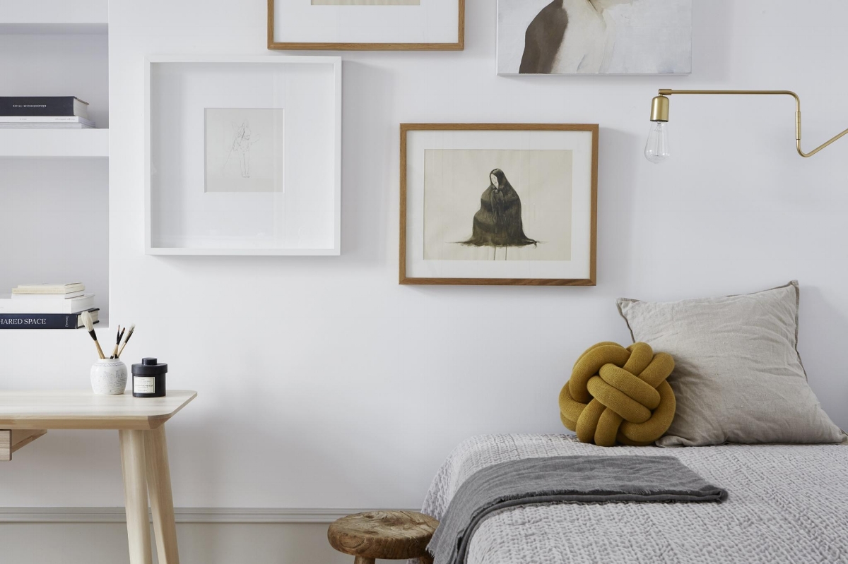 Josefin Haag designed small Stockholm apartment with neutrals and gallery wall