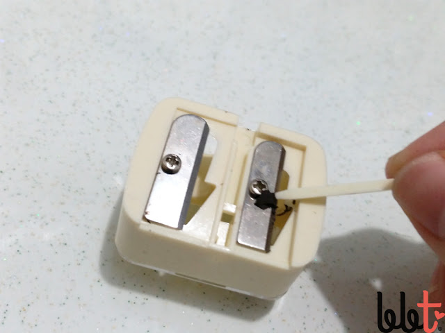 dual sharpener with pick in action