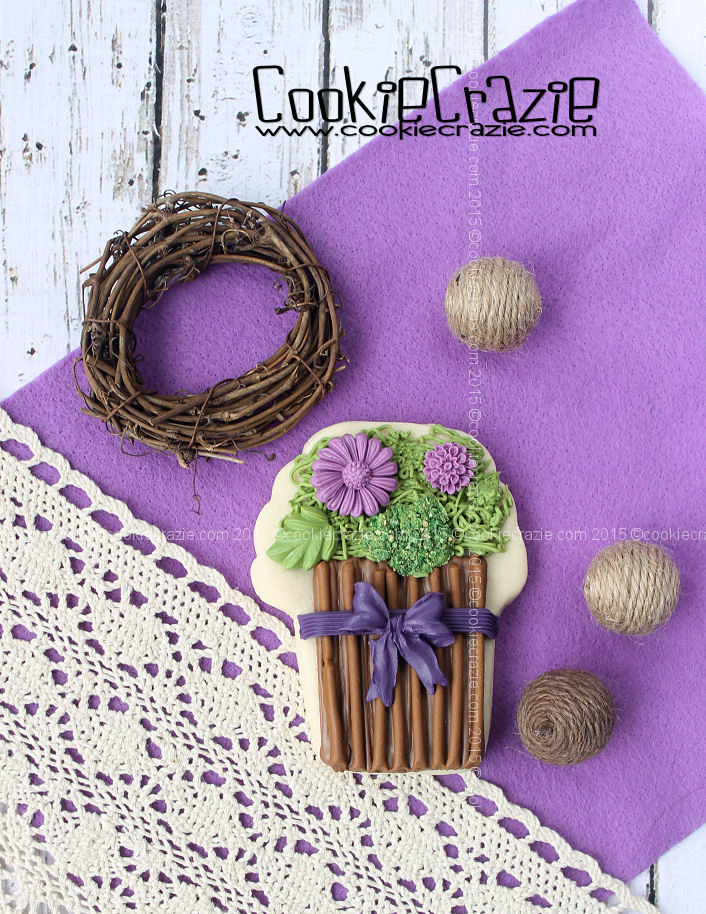 /www.cookiecrazie.com//2015/05/stick-flower-basket-cookie-tutorial.html