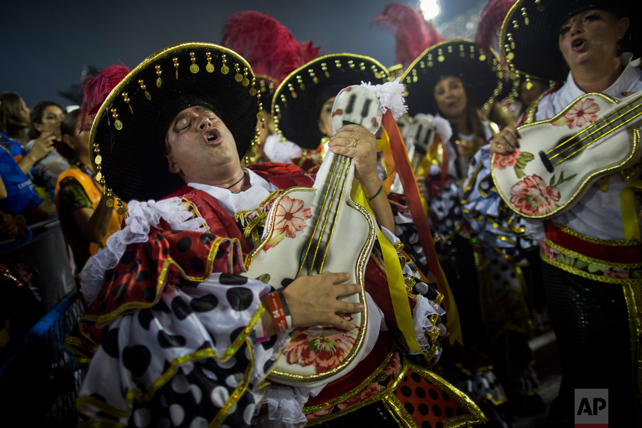 A performer from the Academicos do Grande Rio samba school parades during Carnival celebrations at the Sambadrome in Rio de Janeiro, Brazil, Monday, Feb. 27, 2017. (AP Photo/Mauro Pimentel)