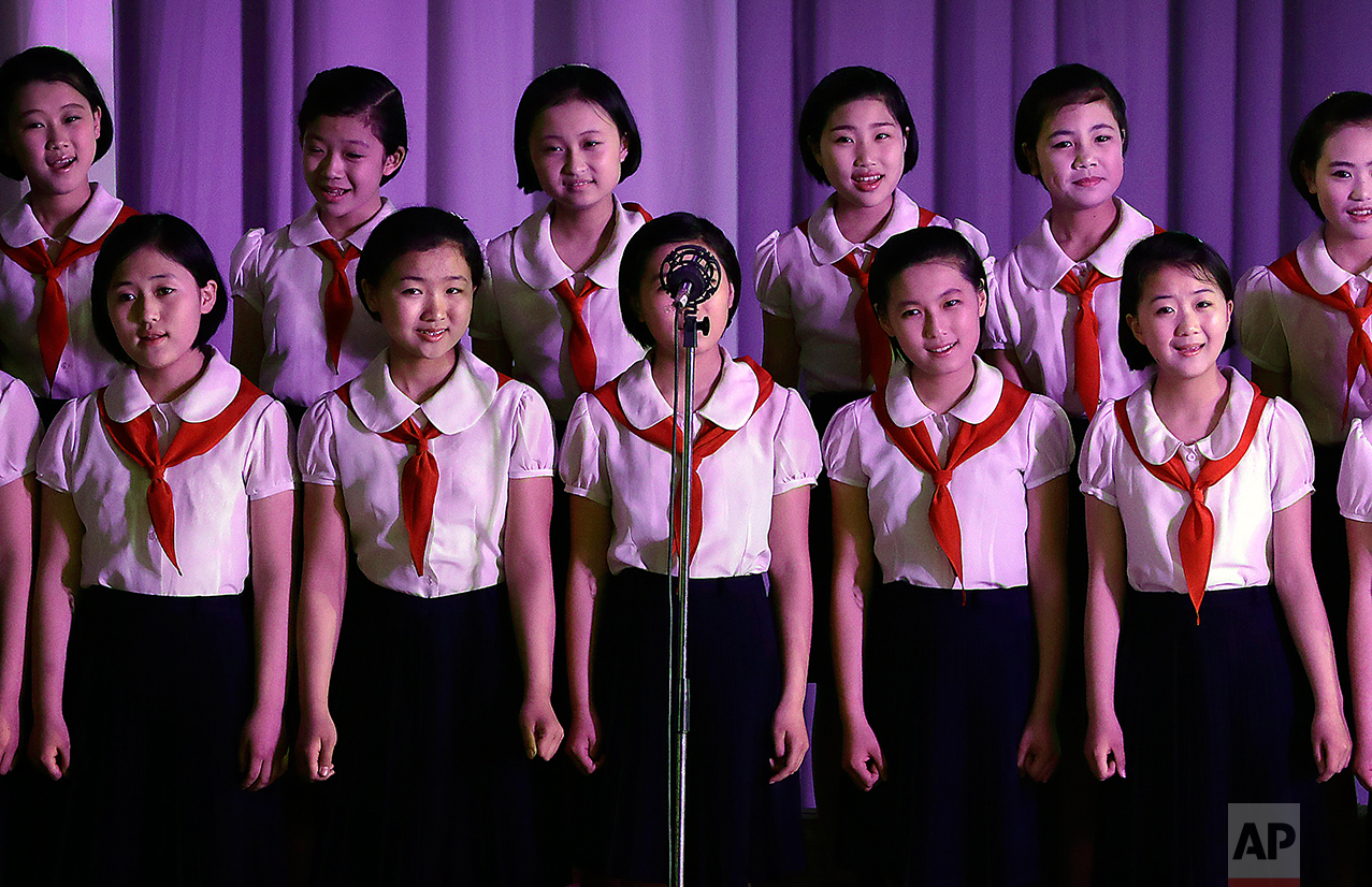 North Korean sing at the Mangyongdae Children's Palace on Friday, April 14, 2017, in Pyongyang, North Korea. (AP Photo/Wong Maye-E)