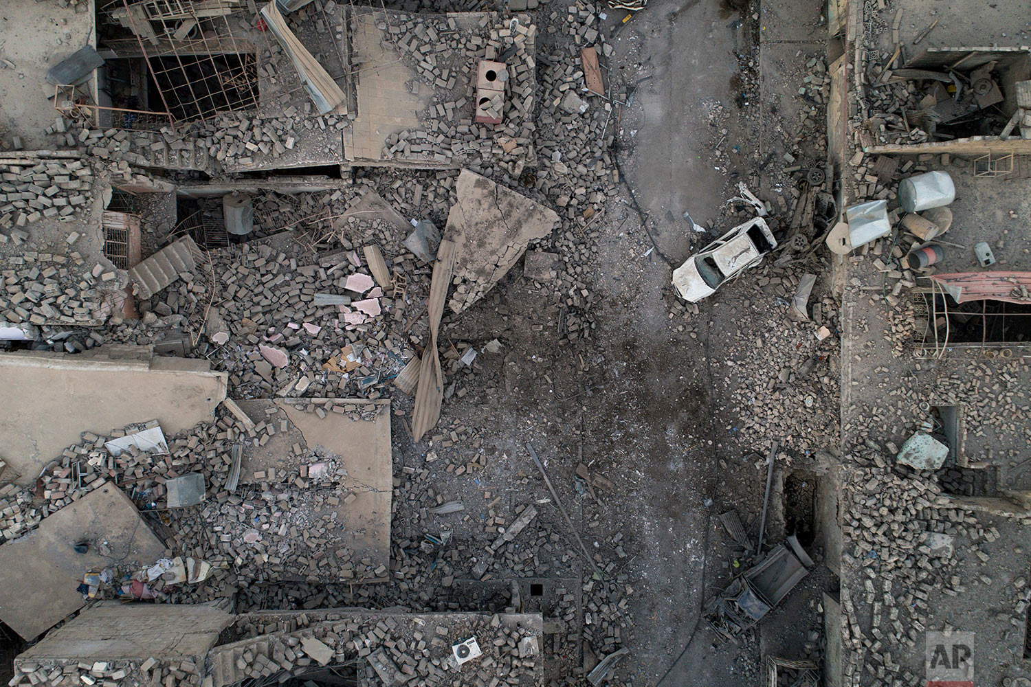 In this July 13, 2017 photo, aerial view of a destroyed street in the west side of Mosul, Iraq. (AP Photo/Felipe Dana)