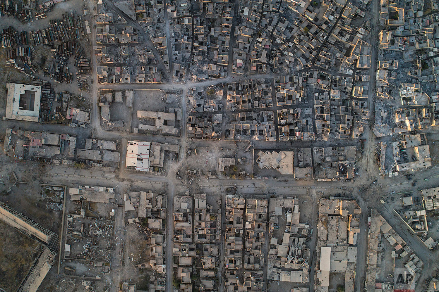 In this June 29, 2017 photo, aerial view of damaged buildings in the Old City of Mosul, Iraq. (AP Photo/Felipe Dana)