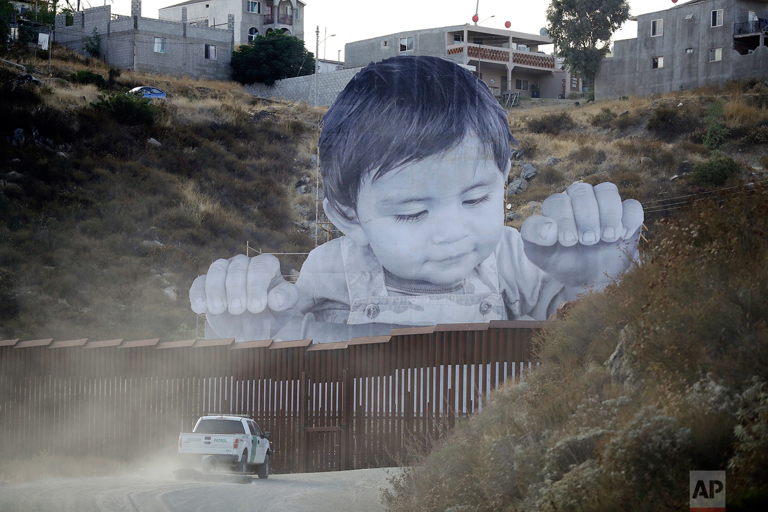 Peering Toddler Border Wall