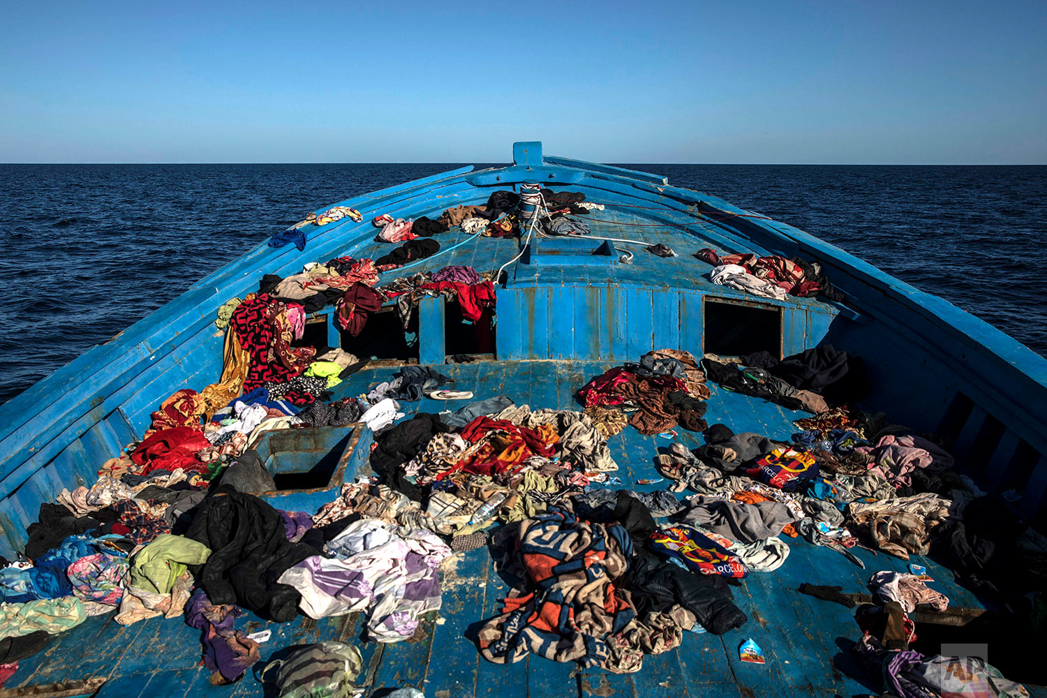  In this Tuesday, Jan. 16, 2018 photo, a wooden boat used by 450 refugees and migrants, mostly from Eritrea, remains abandoned off the Libyan coast after they were rescued by aid workers of the Spanish NGO Proactiva Open Arms, 34 miles north of Kasr-El-Karabulli, Libya. (AP Photo/Santi Palacios)&nbsp; |&nbsp; See these photos on AP Images  