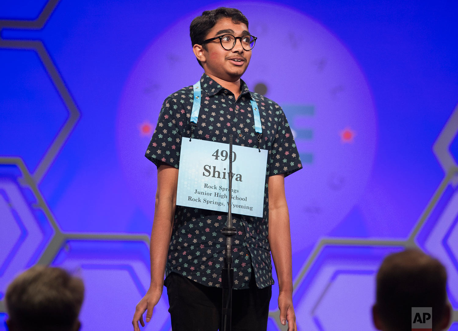  Shiva Yeshlur, 13, from Rock Springs, Wyo., jumps into the air after correctly spelling "diastrophism" during the third round of the Scripps National Spelling Bee in Oxon Hill, Md., Wednesday, May 30, 2018. (AP Photo/Cliff Owen) 