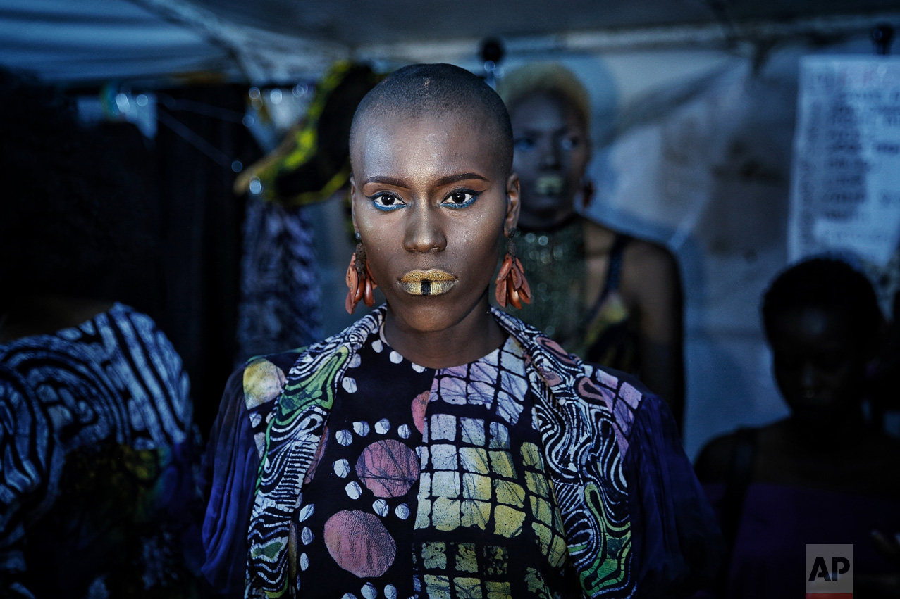 A models waits backstage during Dakar Fashion Week in the Senegalese capital, Friday June 30, 2017. (AP Photo/Finbarr O'Reilly)