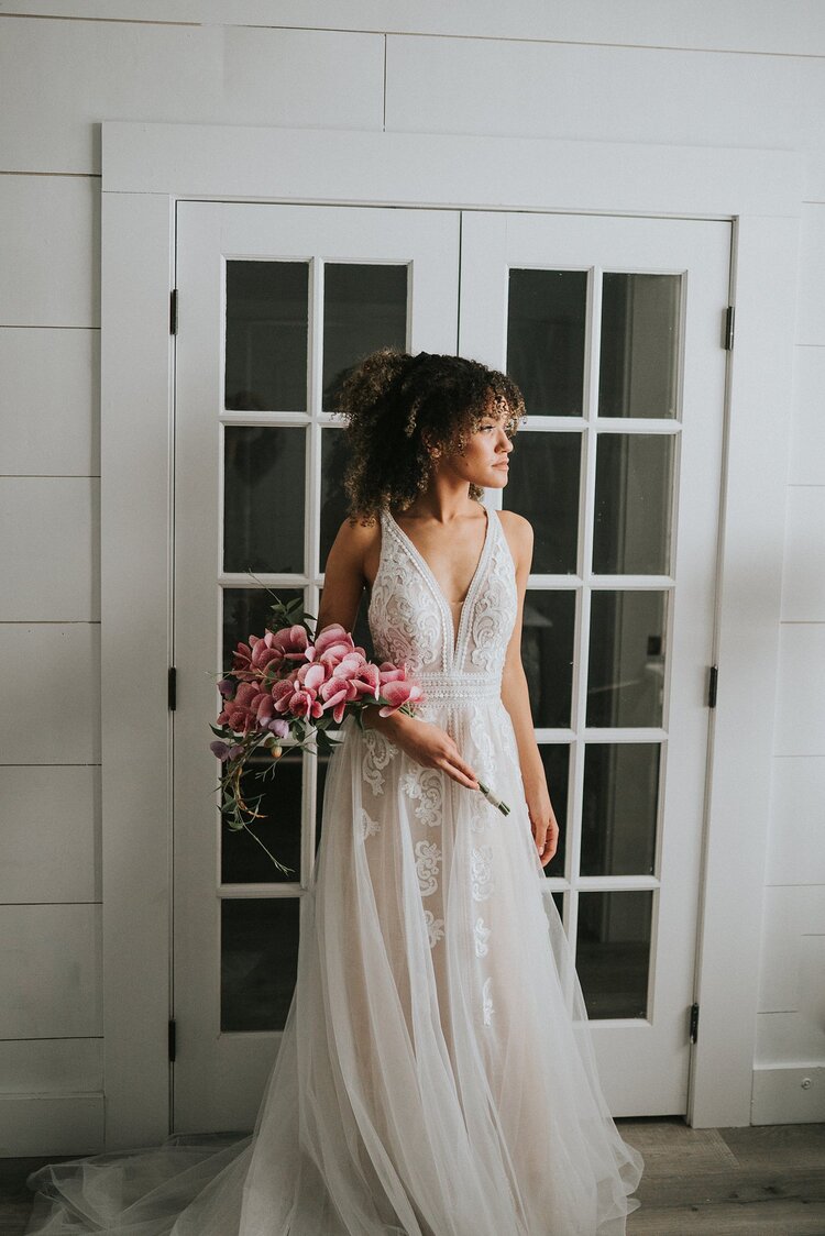 Jackson-hole-wedding-elopement-bridal-arrival-small-bouquet-chiffon-dress-looking-wedding-bride-photographer-knoxville-look-for-the-light-photo-video