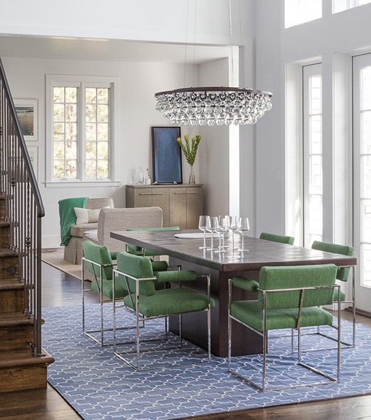  A light-filled contemporary California dining room by Mead Quin features the 1188 dining chair in springy green fabric. photo: David Duncan Livingston 
